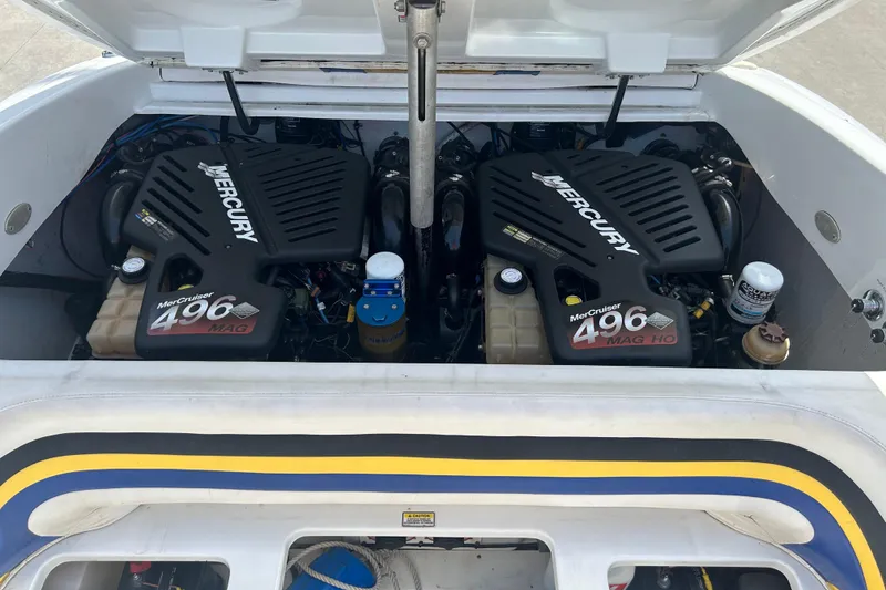 Slide: The Image of Twin Mercury MerCruiser 496 engines in a 2005 Baha Cruisers 302 boat. - 73