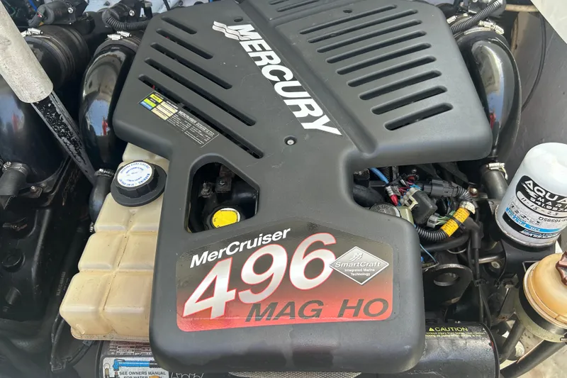 Slide: The Image of MerCruiser 496 MAG HO engine in a 2005 Baha Cruisers 302 boat. - 74