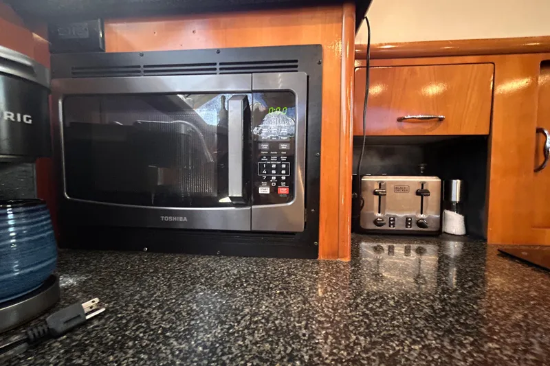Slide: The Image of Kitchen area in 2005 Carver 36 Motor Yacht with microwave and toaster. - 81