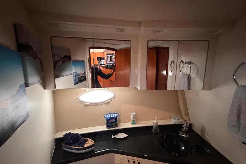 Slide: The Image of Bathroom interior of 2005 Carver 36 Motor Yacht with mirror and sink. - 102
