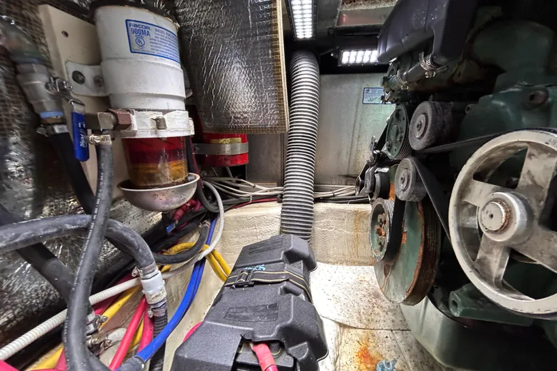 Slide: The Image of Engine room of 2005 Carver 36 Motor Yacht with visible components and wiring. - 133