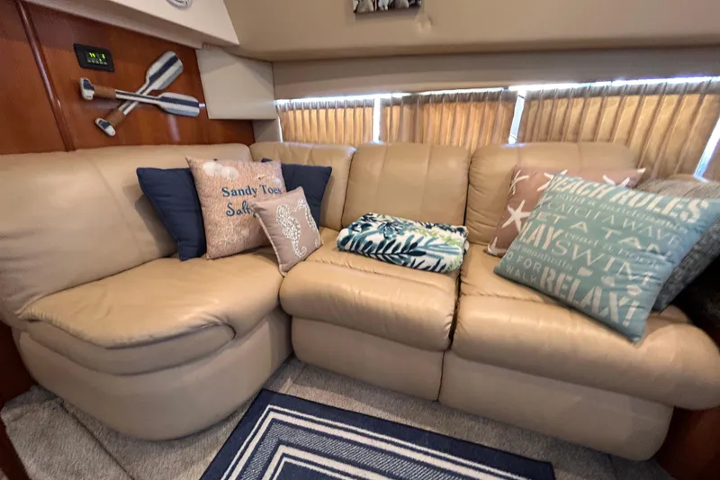Slide: The Image of Cozy interior of 2005 Carver 36 Motor Yacht with plush seating and decorative pillows. - 116