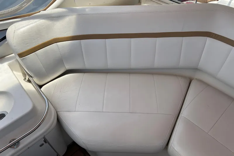 Slide: The Image of White leather seating on a 2005 Carver 36 Motor Yacht, featuring elegant design and comfort. - 52