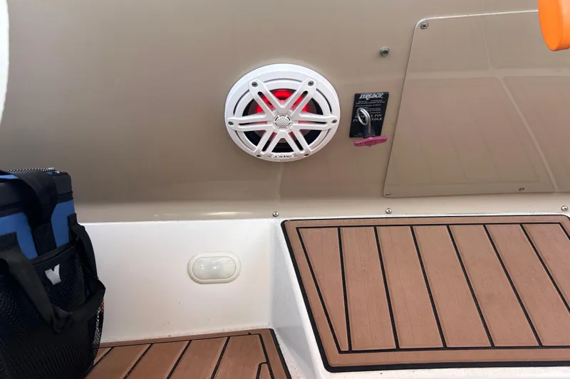 Slide: The Image of 2005 Carver 36 Motor Yacht interior with speaker and teak flooring. - 147