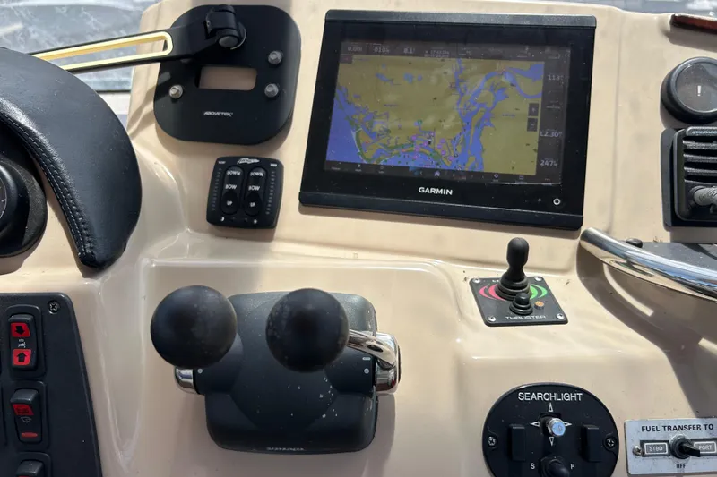 Slide: The Image of Control panel of a 2005 Carver 36 Motor Yacht with Garmin navigation display. - 39