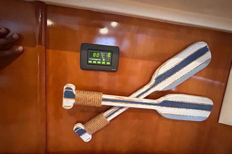 Slide: The Image of Decorative paddles and control panel on 2005 Carver 36 Motor Yacht interior. - 139