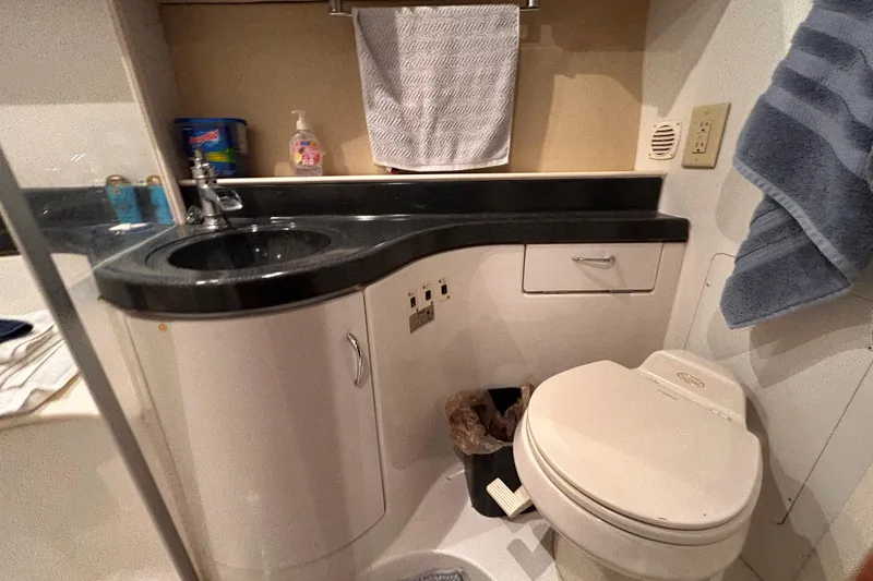 Slide: The Image of Bathroom interior of 2005 Carver 36 Motor Yacht with sink and toilet. - 124