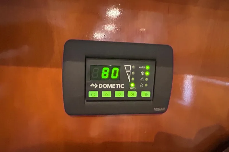 Slide: The Image of Dometic control panel on 2005 Carver 36 Motor Yacht displaying temperature settings. - 138