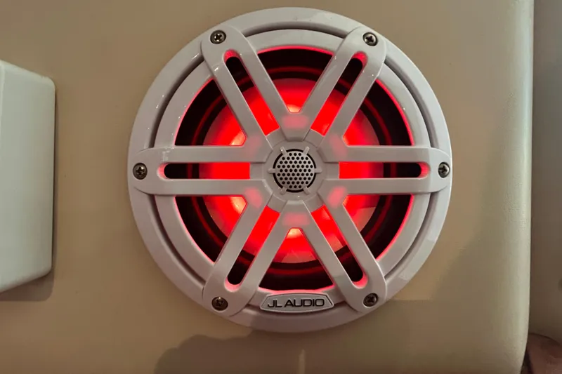 Slide: The Image of White JL Audio speaker with red LED light on 2005 Carver 36 Motor Yacht. - 141