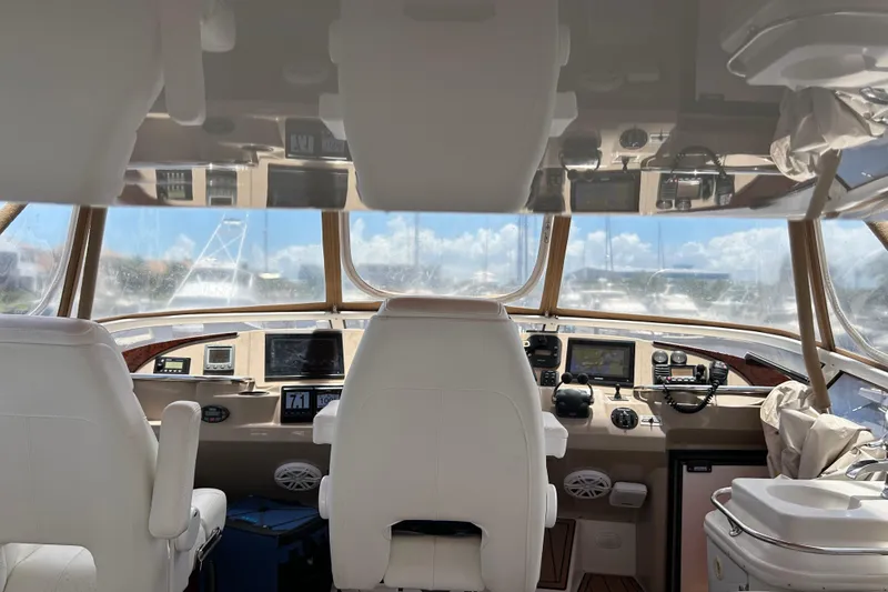 Slide: The Image of Interior view of 2005 Carver 36 Motor Yacht cockpit with navigation equipment. - 25