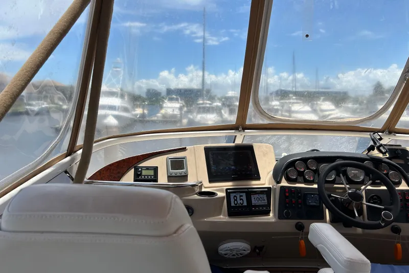 Slide: The Image of Interior view of 2005 Carver 36 Motor Yacht cockpit with navigation instruments. - 27