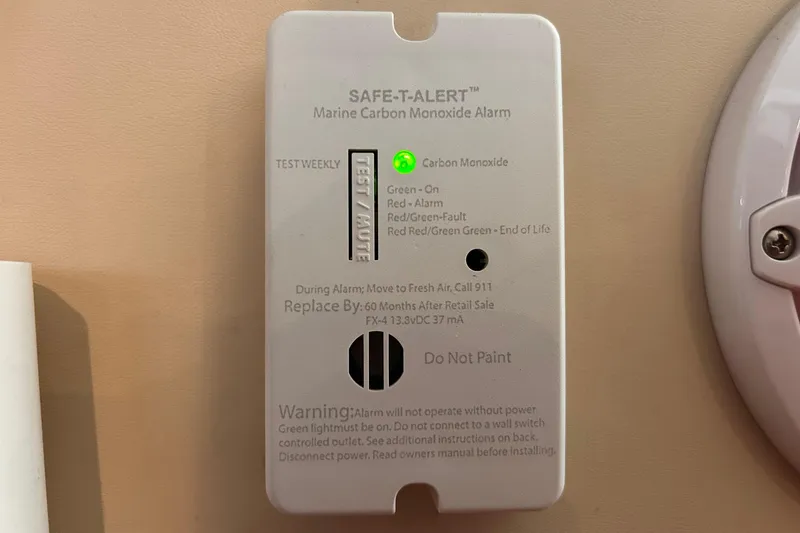 Slide: The Image of Marine carbon monoxide alarm on 2005 Carver 36 Motor Yacht, green light indicates normal operation. - 140