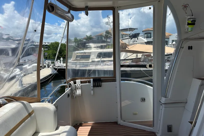 Slide: The Image of Interior view of a 2005 Carver 36 Motor Yacht docked at a marina. - 17