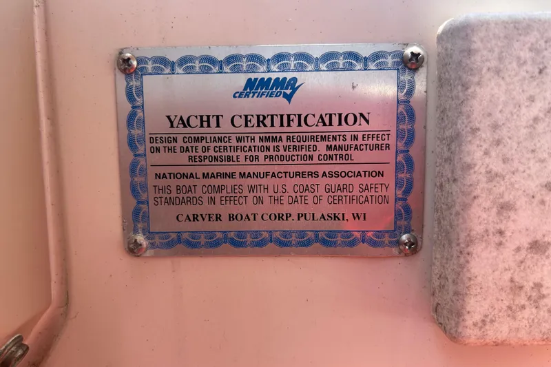 Slide: The Image of 2005 Carver 36 Motor Yacht certification plaque, NMMA certified, Coast Guard compliant. - 142