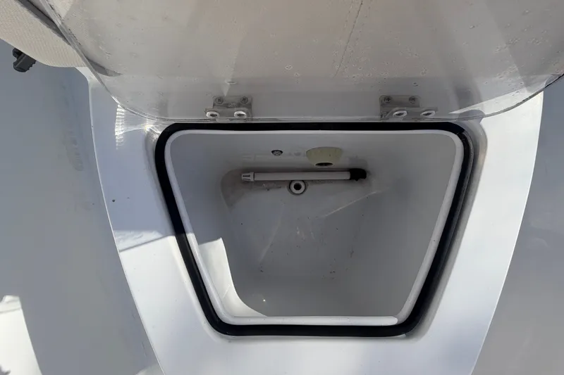 Slide: The Image of Open storage compartment on 2025 Sea Hunt Gamefish 27CB boat. - 50