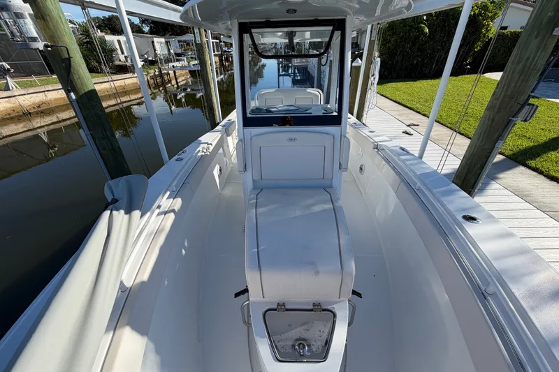 Slide: The Image of 2025 Sea Hunt Gamefish 27CB boat interior, featuring spacious seating and sleek design. - 48