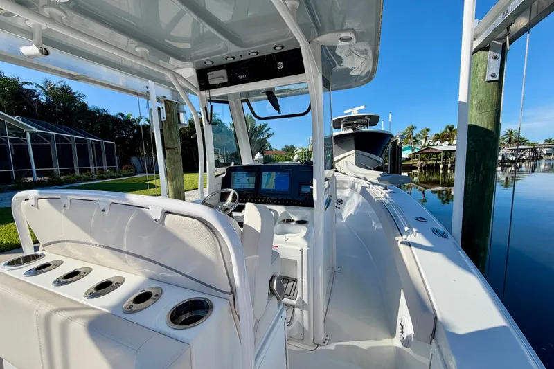 Slide: The Image of 2025 Sea Hunt Gamefish 27CB boat interior with advanced navigation system and sleek design. - 22