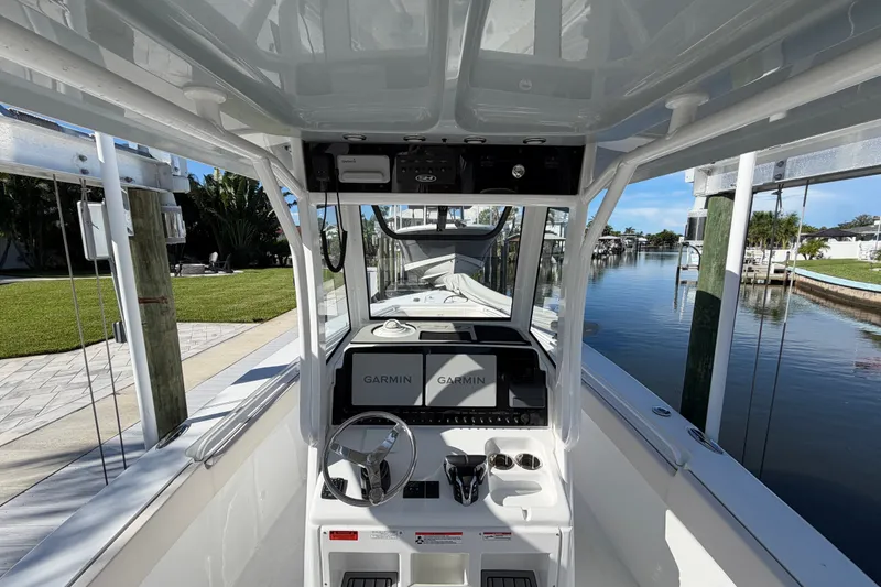 Slide: The Image of 2025 Sea Hunt Gamefish 27CB boat interior with Garmin navigation system. - 25