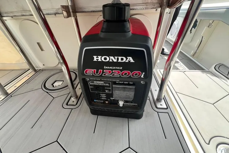 Slide: The Image of Honda EU2200i generator on 2005 Hydra-Sports 3300 VX boat deck. - 39