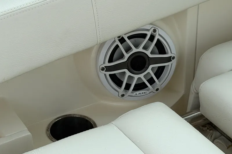 Slide: The Image of Speaker and seating detail on 2021 Cobia 240 Dual Console boat. - 34