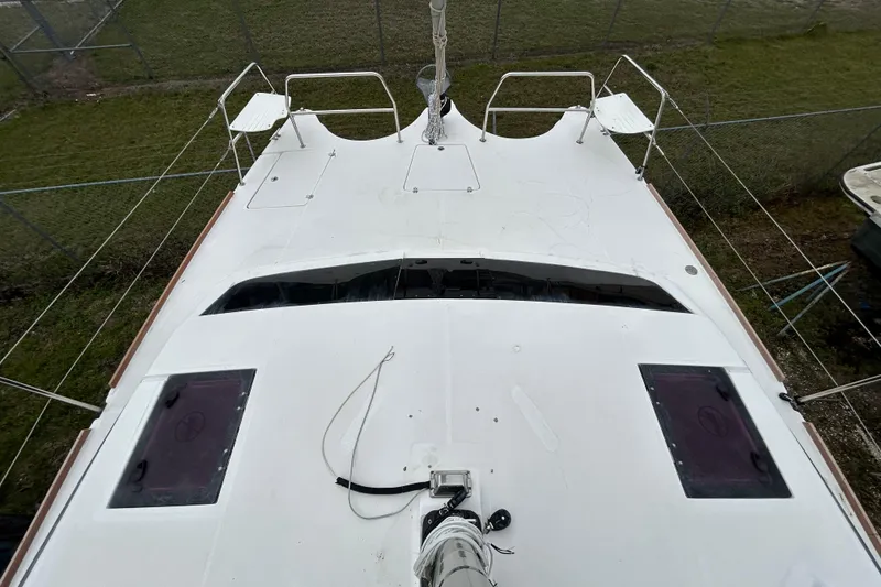 Slide: The Image of Top view of 2013 Gemini Legacy 35 catamaran deck, featuring hatches and railing. - 36