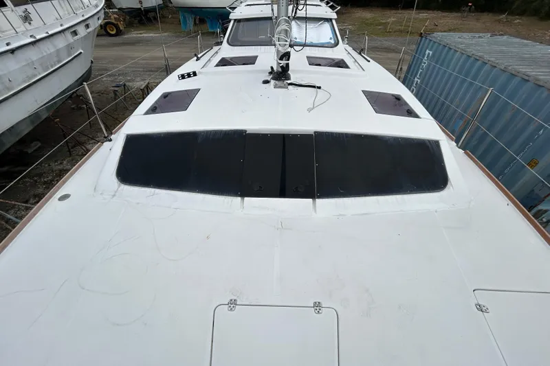 Slide: The Image of 2013 Gemini Legacy 35 catamaran deck view, featuring sleek design and spacious layout. - 51