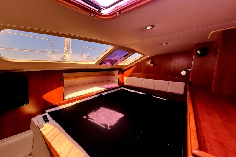 Slide: The Image of Interior of 2013 Gemini Legacy 35 yacht with wood finish and skylights. - 127
