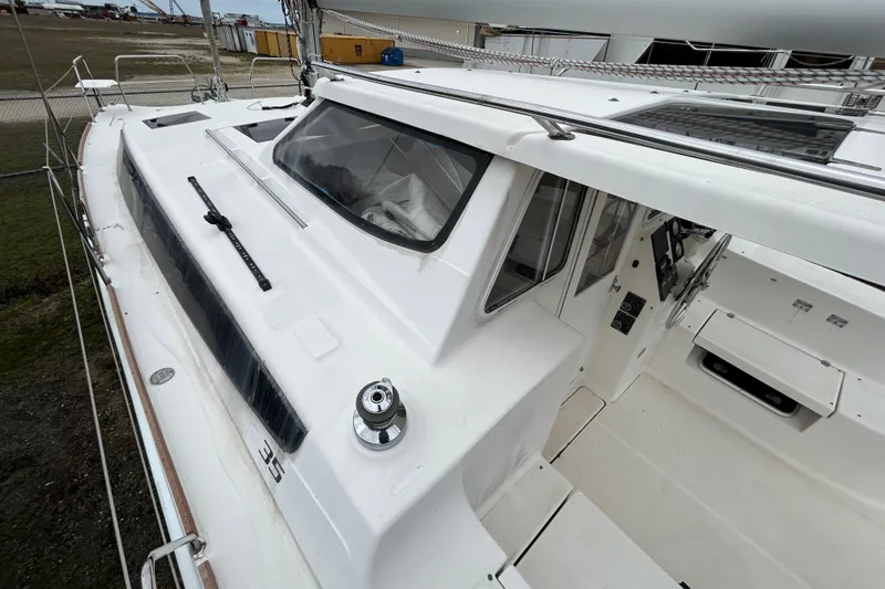Slide: The Image of 2013 Gemini Legacy 35 sailboat cockpit and deck, showcasing sleek design and modern features. - 31