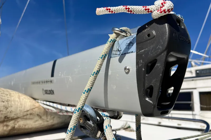 Slide: The Image of Close-up of a 2013 Gemini Legacy 35 sailboat mast with ropes and clear blue sky. - 161