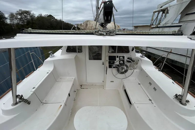 Slide: The Image of Cockpit of 2013 Gemini Legacy 35 sailboat with steering wheel and seating. - 61