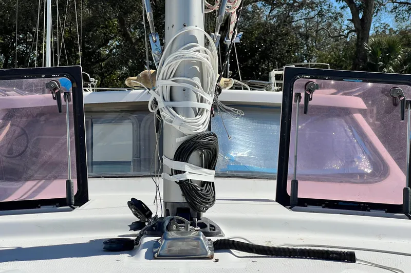 Slide: The Image of Sailboat deck of 2013 Gemini Legacy 35 with rigging and windows. - 163