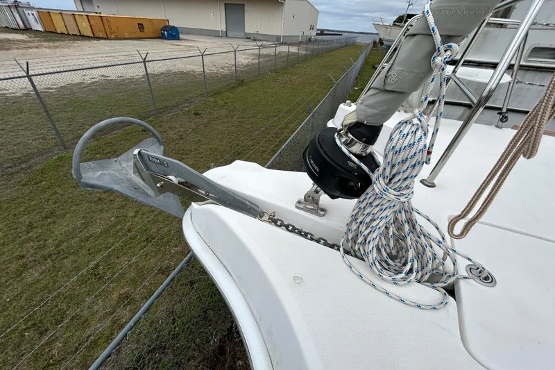Slide: The Image of Bow of 2013 Gemini Legacy 35 sailboat with anchor and coiled rope. - 46