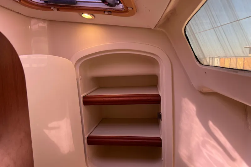 Slide: The Image of Interior shelving of 2013 Gemini Legacy 35 sailboat with natural light. - 110