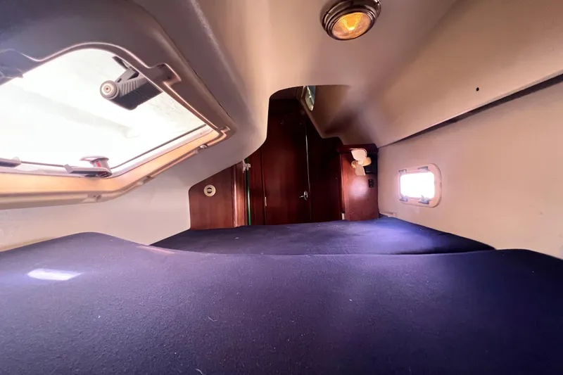 Slide: The Image of Interior cabin of 2013 Gemini Legacy 35 sailboat with windows and lighting. - 101