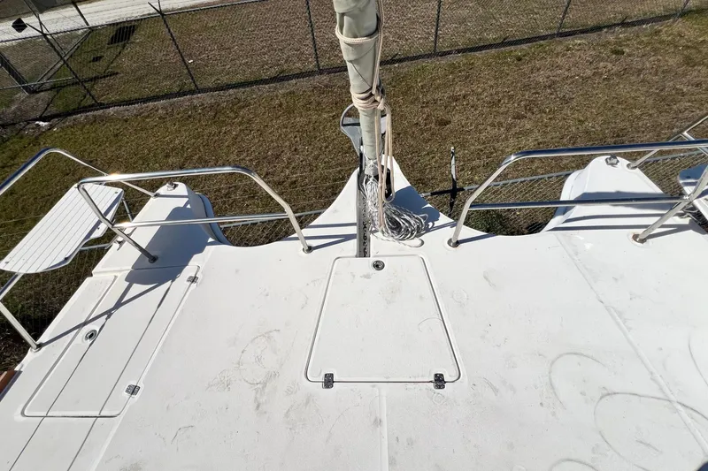 Slide: The Image of Deck view of 2013 Gemini Legacy 35 catamaran, featuring railings and seating. - 40