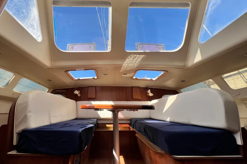 Slide: The Image of Interior of 2013 Gemini Legacy 35 catamaran with skylights and seating area. - 88