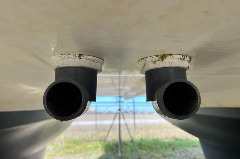 Slide: The Image of Close-up of drainage pipes on a 2013 Gemini Legacy 35 catamaran hull. - 149