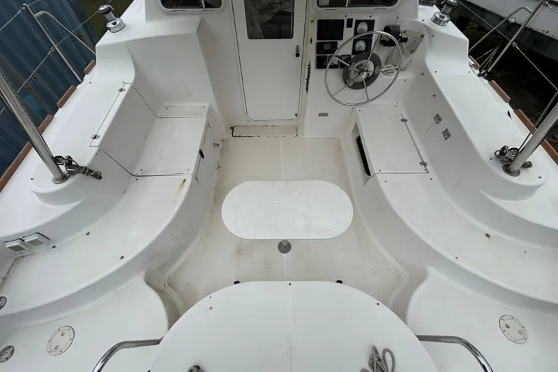 Slide: The Image of Cockpit of 2013 Gemini Legacy 35 sailboat with steering wheel and seating. - 60