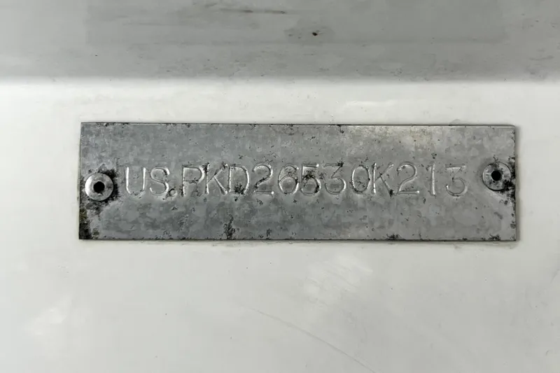 Slide: The Image of Metal identification plate on a 2013 Novurania Chase 23 boat. - 52