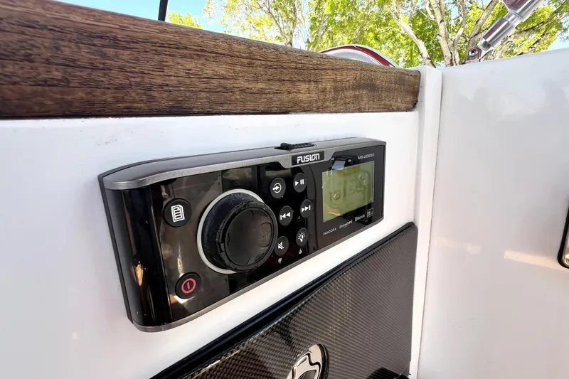 Slide: The Image of Fusion MS-UD650 stereo system on 2013 Novurania Chase 23 boat dashboard. - 40