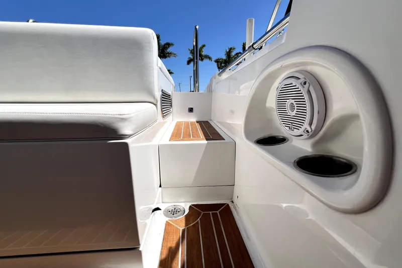 Slide: The Image of Interior view of 2013 Novurania Chase 23 boat with seating and speaker. - 76