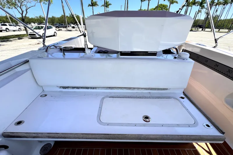 Slide: The Image of 2013 Novurania Chase 23 boat interior with seating and storage area. - 60