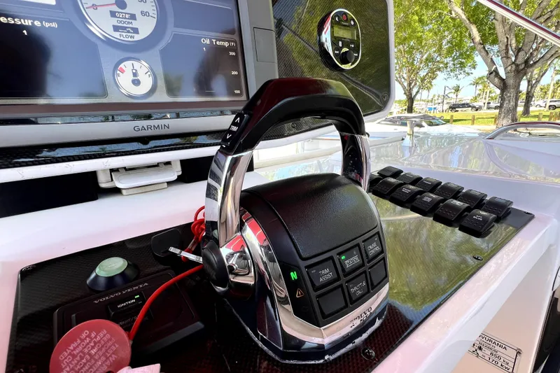Slide: The Image of Close-up of 2013 Novurania Chase 23 boat controls with Garmin display and throttle. - 35