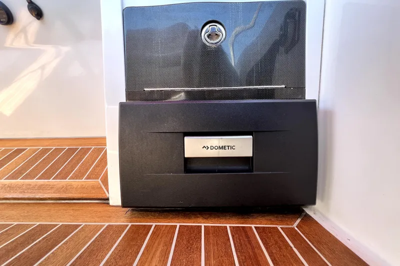 Slide: The Image of Dometic unit on 2013 Novurania Chase 23 boat with wood flooring. - 46