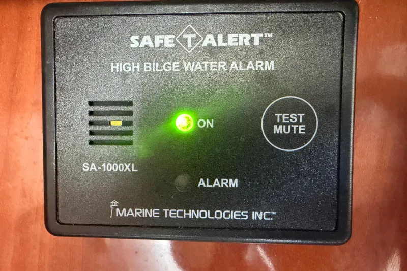 Slide: The Image of Safe-T-Alert high bilge water alarm, model SA-1000XL, with green light on. - 61