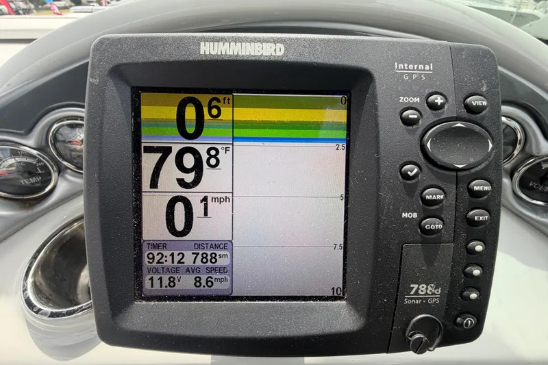 Slide: The Image of Humminbird sonar GPS display on 2012 Crownline 236 SC boat dashboard. - 37