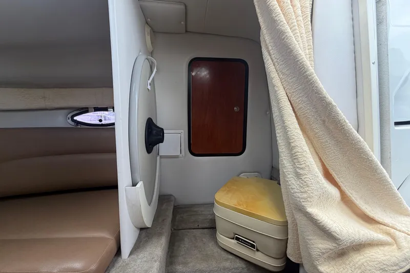 Slide: The Image of Interior cabin of 2012 Crownline 236 SC boat with seating and storage. - 67
