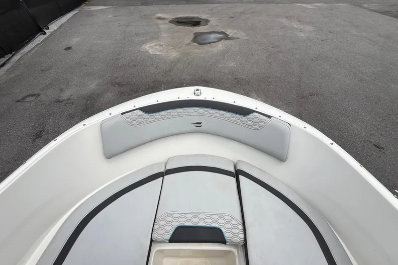 Slide: The Image of 2024 Bayliner Element M17 boat interior with cushioned seating and sleek design. - 33