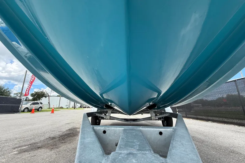 Slide: The Image of 2024 Bayliner Element M17 boat on trailer, viewed from below. - 14