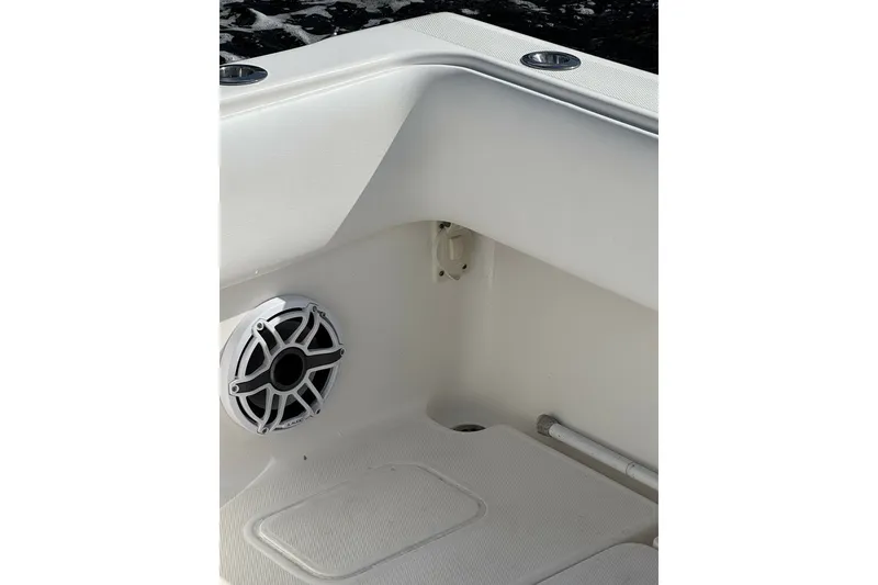Slide: The Image of Interior view of 2013 Invincible 36 Open Fisherman boat with speaker detail. - 10